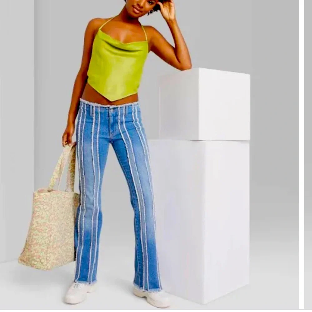 Women's Low-Rise Flare Jeans with Frayed Seaming - Picture 2 of 6